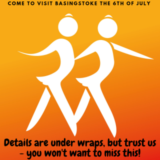 Can you guess? An orange poster with two icons of people in white.